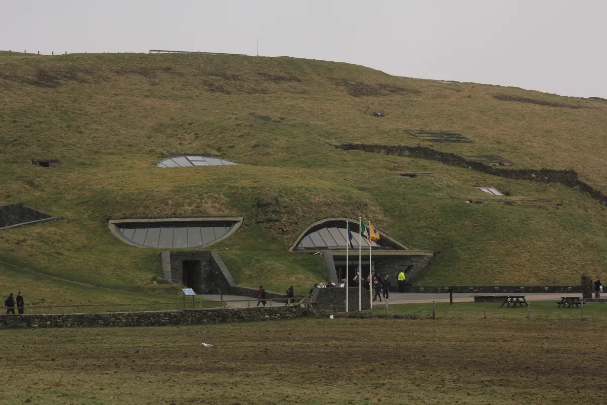 The Cliffs of Moher visitor centre set into the hillside, where Cliffs of Moher tours from Dublin stop, County Clare, Ireland